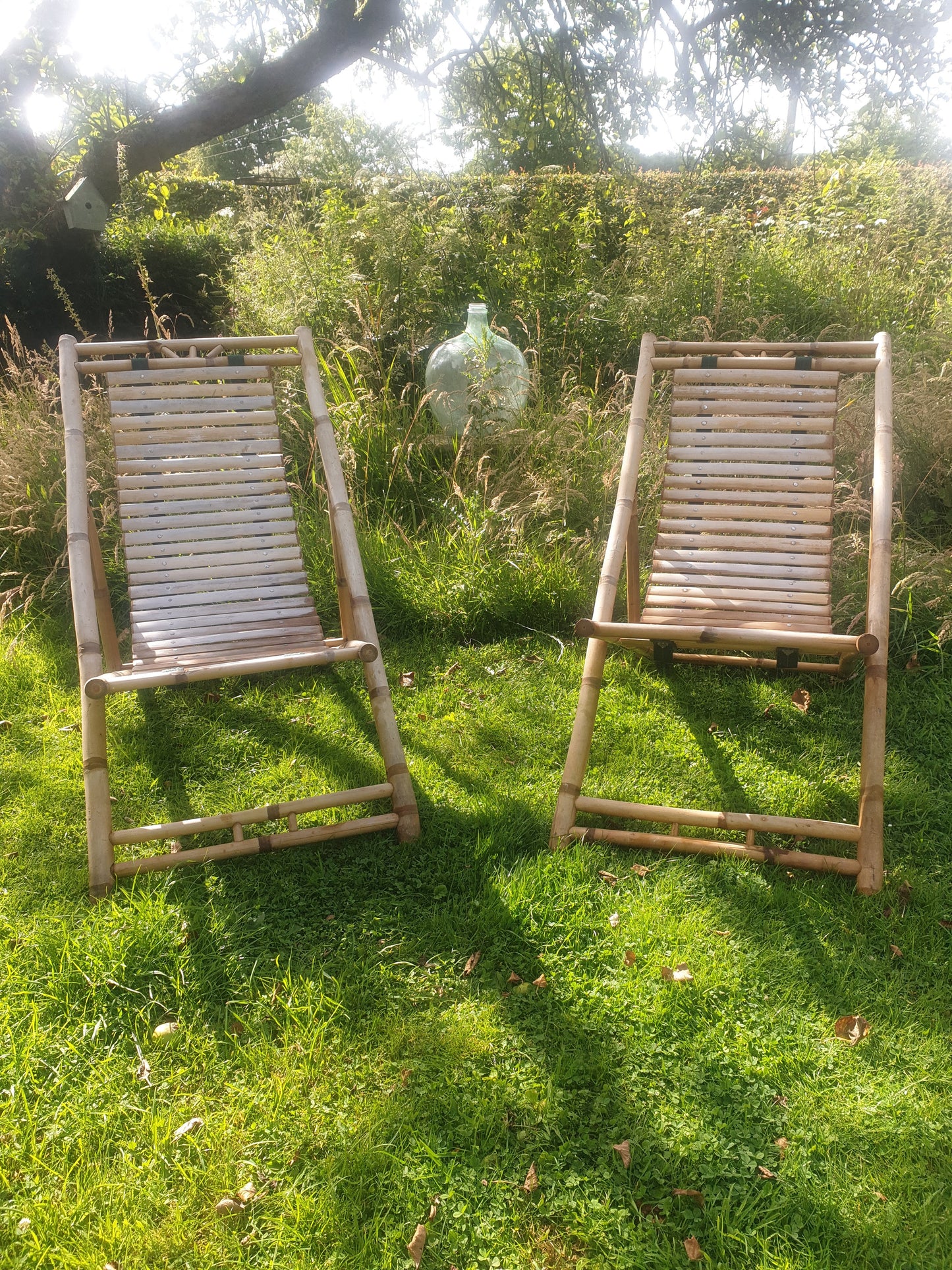 Vintage folding bamboo deckchairs